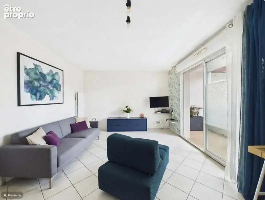 A vendre grand T2 avec balcon et cave - photo 3