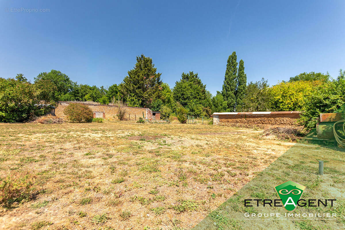 Maison DAMVILLE CENTRE-VILLE - 142 m² - 3 chambres - photo 4