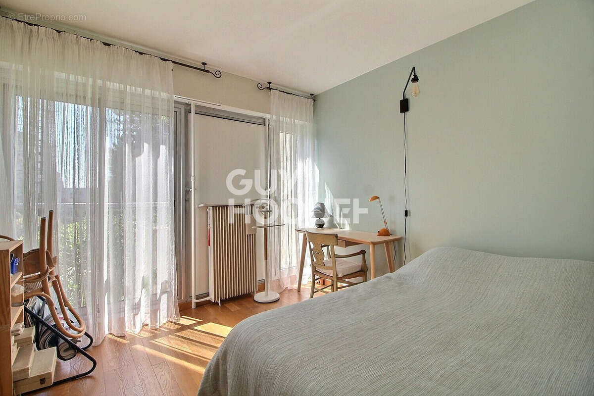 Appartement 4 pièces de 94 m² en rez-de-jardin - photo 6
