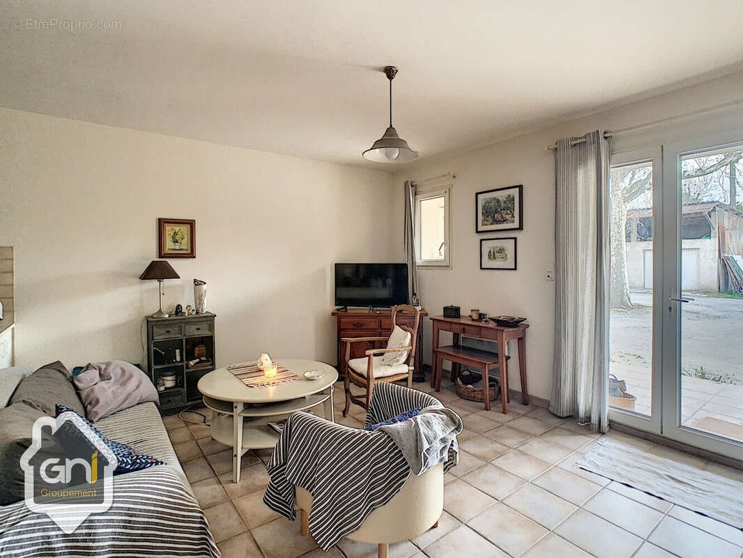 Appartement en rdc - avec parking - photo 3