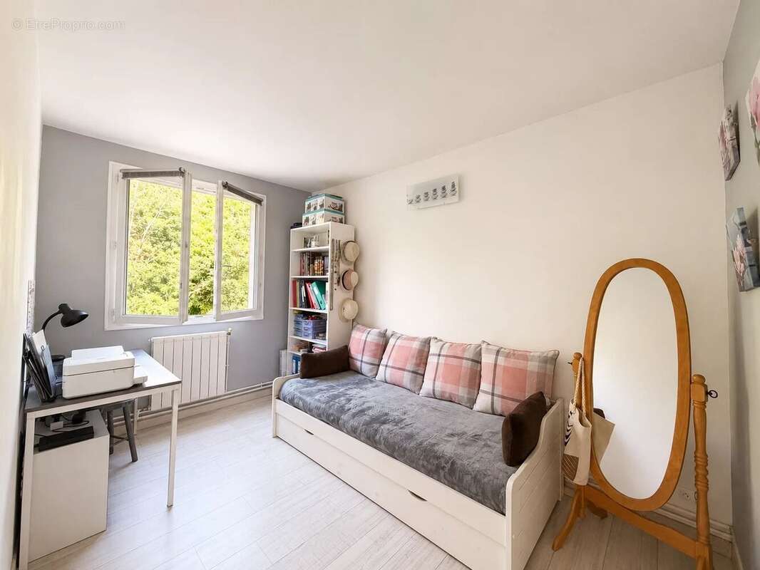 Appartement F3 de 65 m² avec cave et parking privatif - photo 7