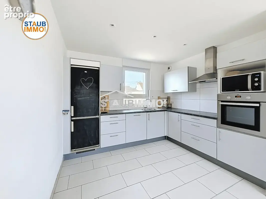 Maison 5 pièces 110 m² à vendre à Village-Neuf (68128) - photo 4