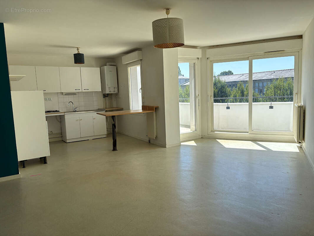 Appartement  4 pièces 74.90 m2 + Garage. - photo 2