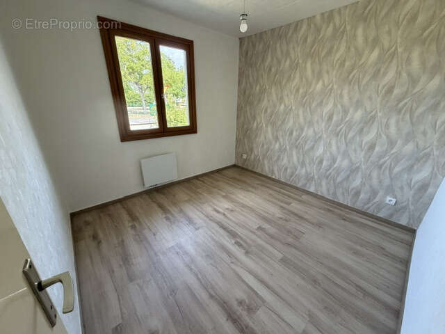 Maison de plain-pied avec garage sur terrain de 900 M2 - photo 11