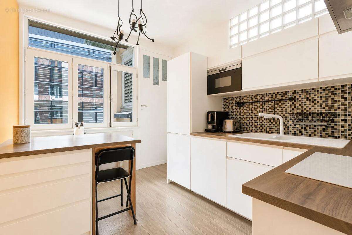 Appartement de 4 pièces de 101 m² à Lille Vauban - photo 7