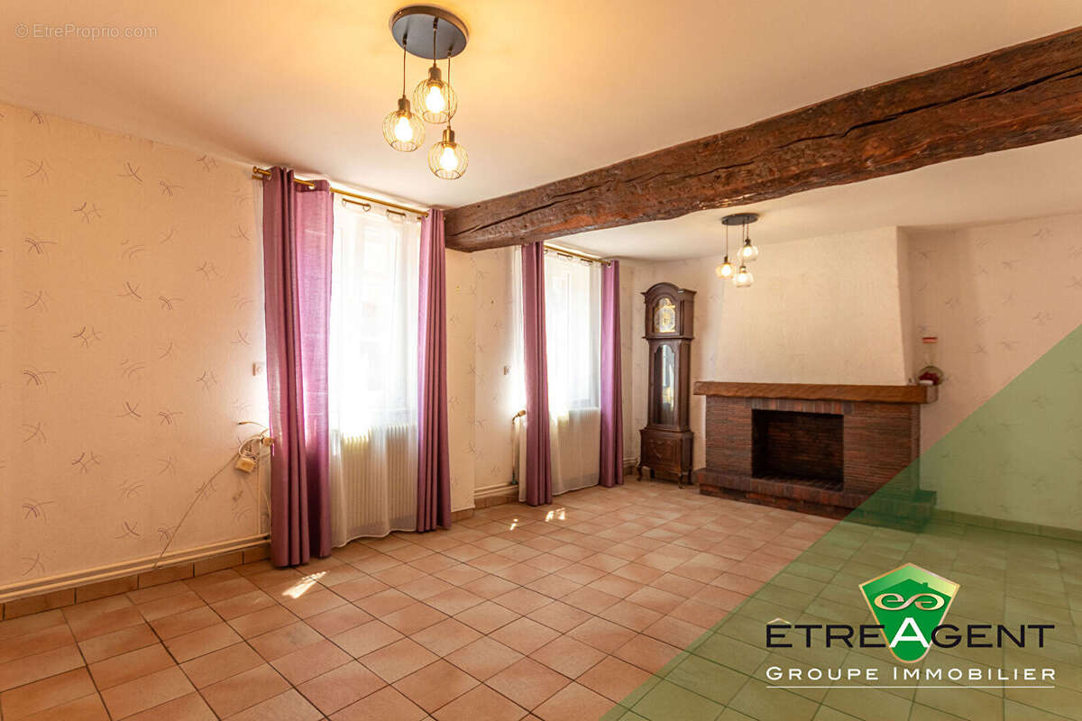 Maison DAMVILLE CENTRE-VILLE - 142 m² - 3 chambres - photo 6