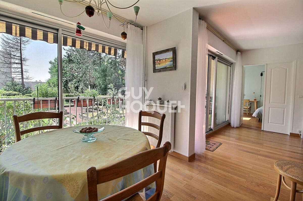 Appartement 4 pièces de 94 m² en rez-de-jardin - photo 4