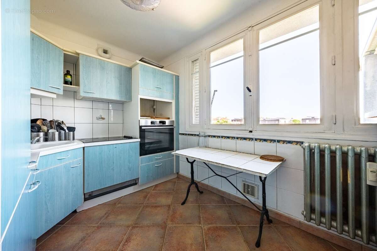 Appartement à vendre 5 pièces DIJON (21) de 95 m² avec grand balcon, cave et garage - photo 6