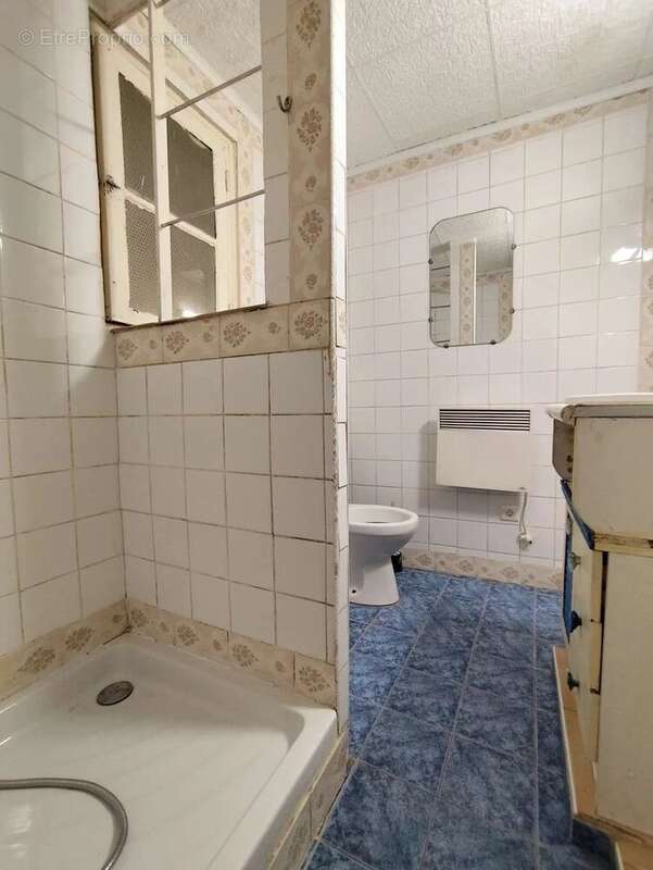 Appartement 90 m²  -  4 pièces + cave - photo 13
