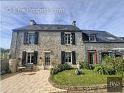 Maison à PORT-EN-BESSIN-HUPPAIN