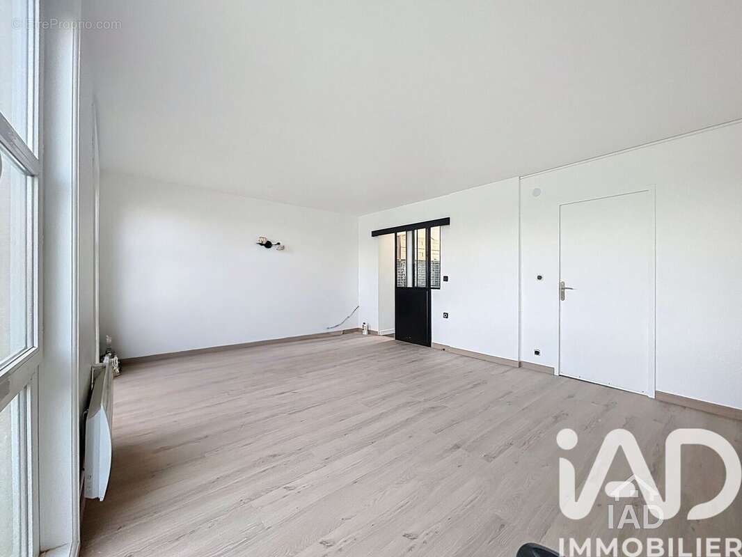Photo 7 - Appartement à VOISINS-LE-BRETONNEUX