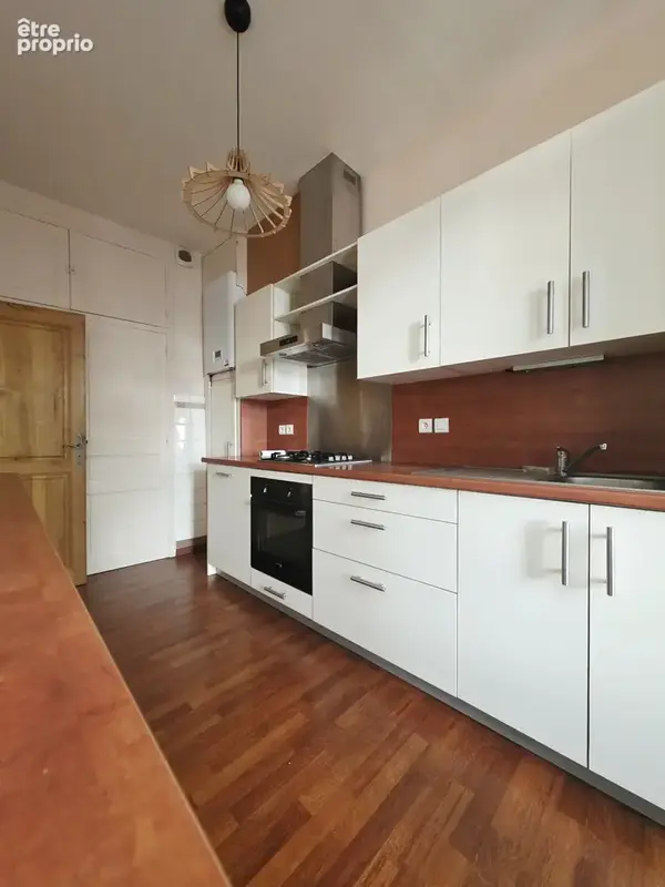 Appartement T4 traversant de 94 m2 avec double garage, balcon et cave - photo 5
