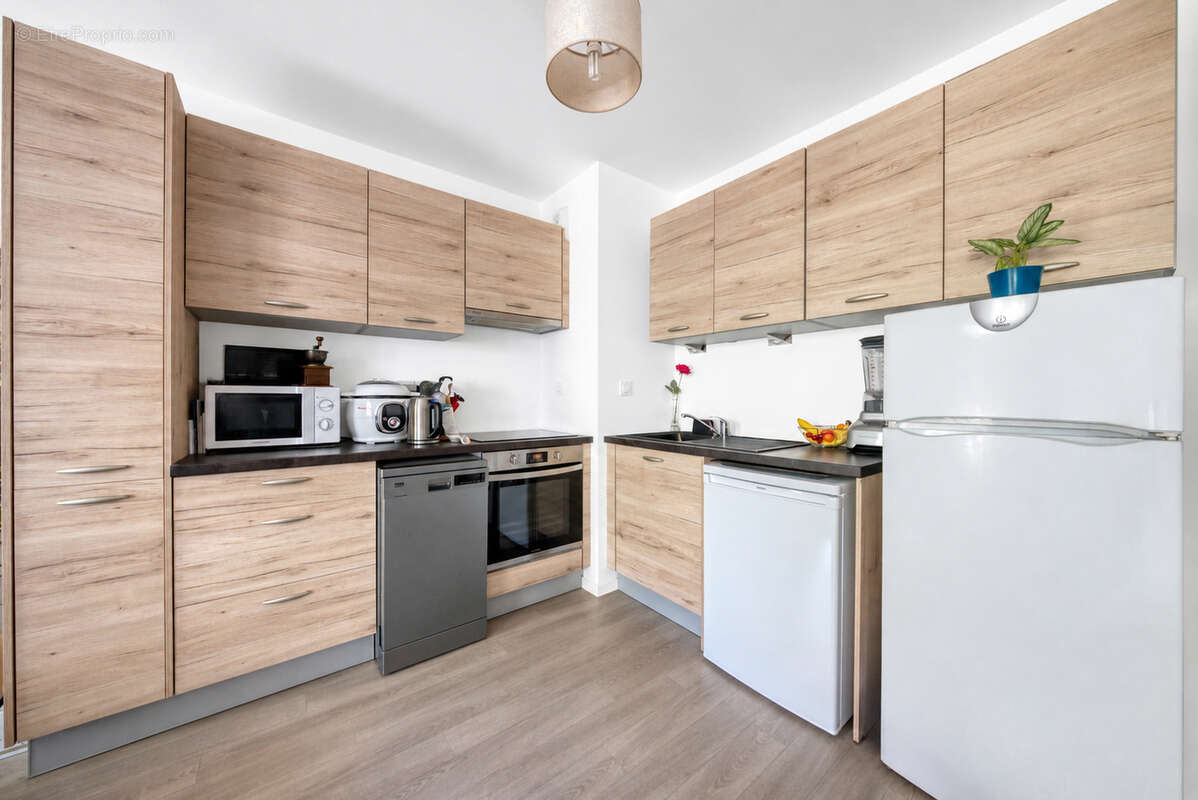 Appartement T4 - Longs Champs - photo 4