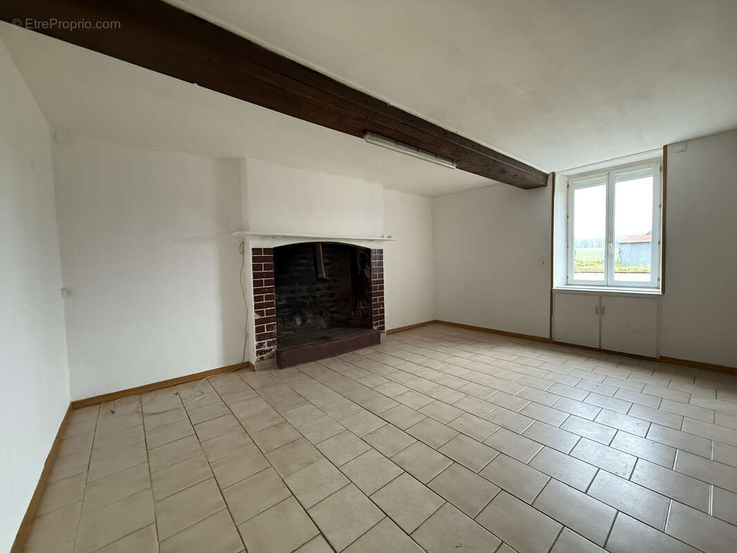 Maison à JUVIGNY-LE-TERTRE