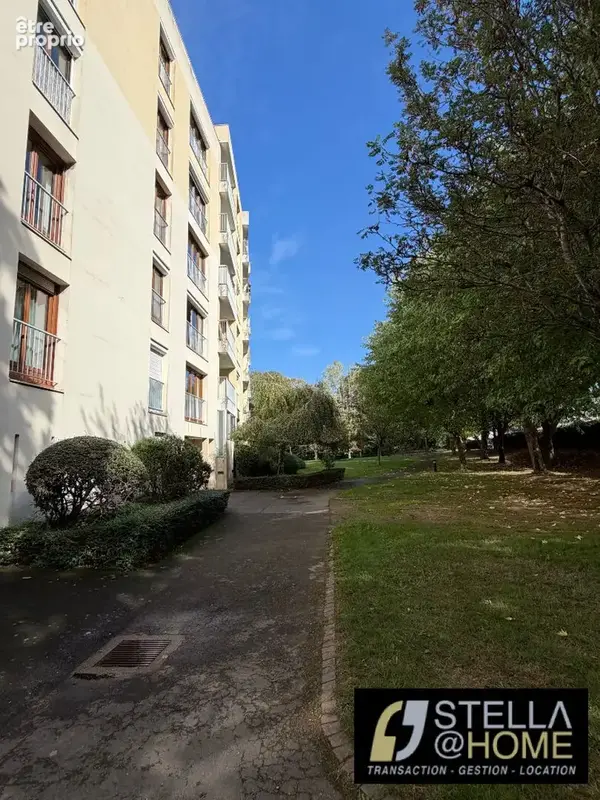 T2 traversant au sein d'une copropriété verdoyante - photo 8
