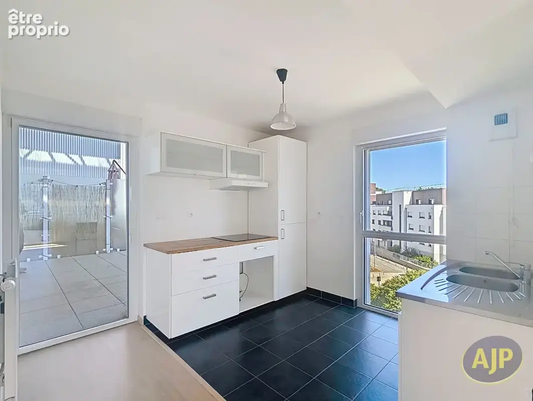 Appartement Duplex avec terrasse et stationnement - photo 3