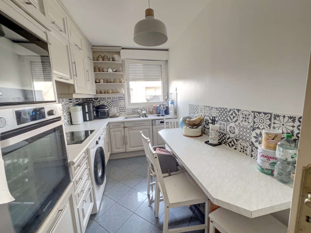 Appartement a vendre 3 pieces 68m2 - centre ville - photo 7