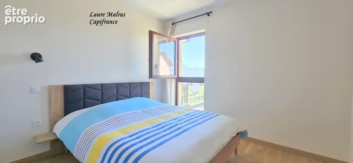 GROISY – A vendre beau T2 avec balcon, vue montagnes, cave, 2 stationnements privatifs - photo 8