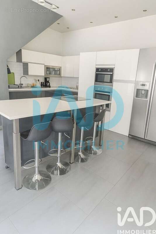 Photo 2 - Maison à AUBERVILLIERS