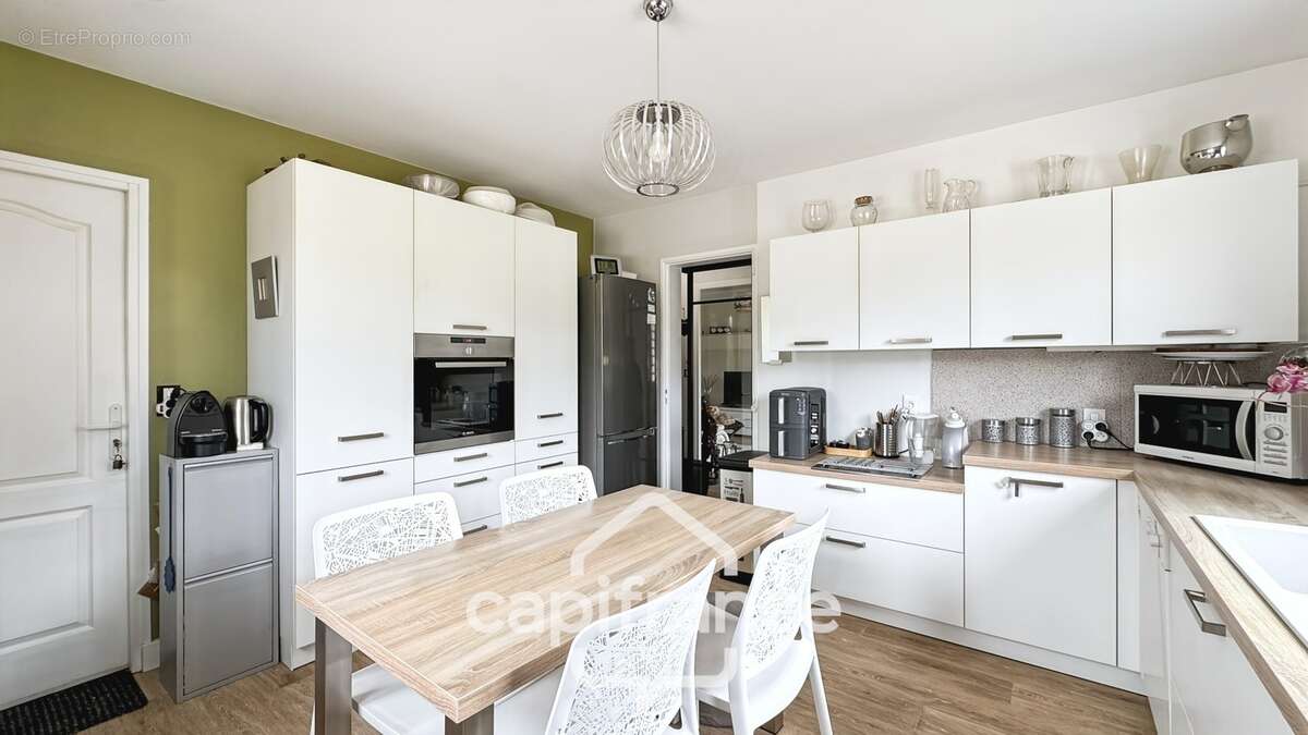 CASTETS 40  – Maison rénovée de 123 m² avec T1 indépendant, sous-sol aménageable de 100 m² et jardin paysagé - photo 7