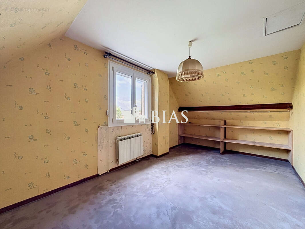 chambre 1 - Maison à HEUDEBOUVILLE