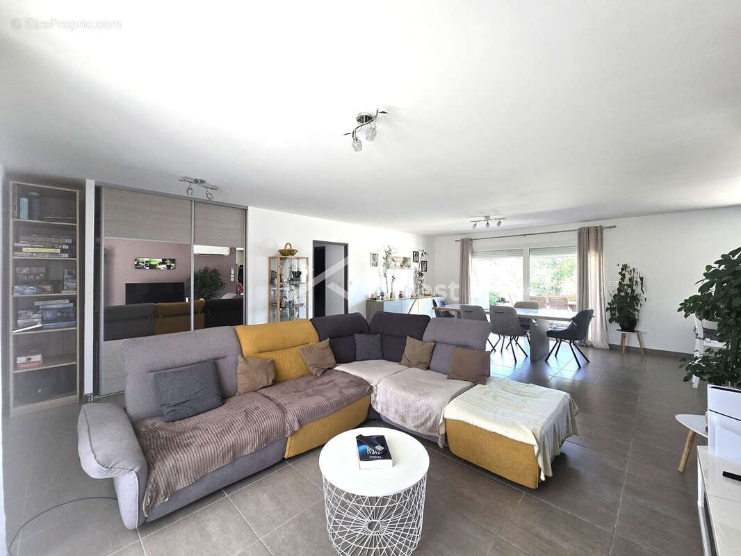 Maison 110 m² à Angeville  - photo 3