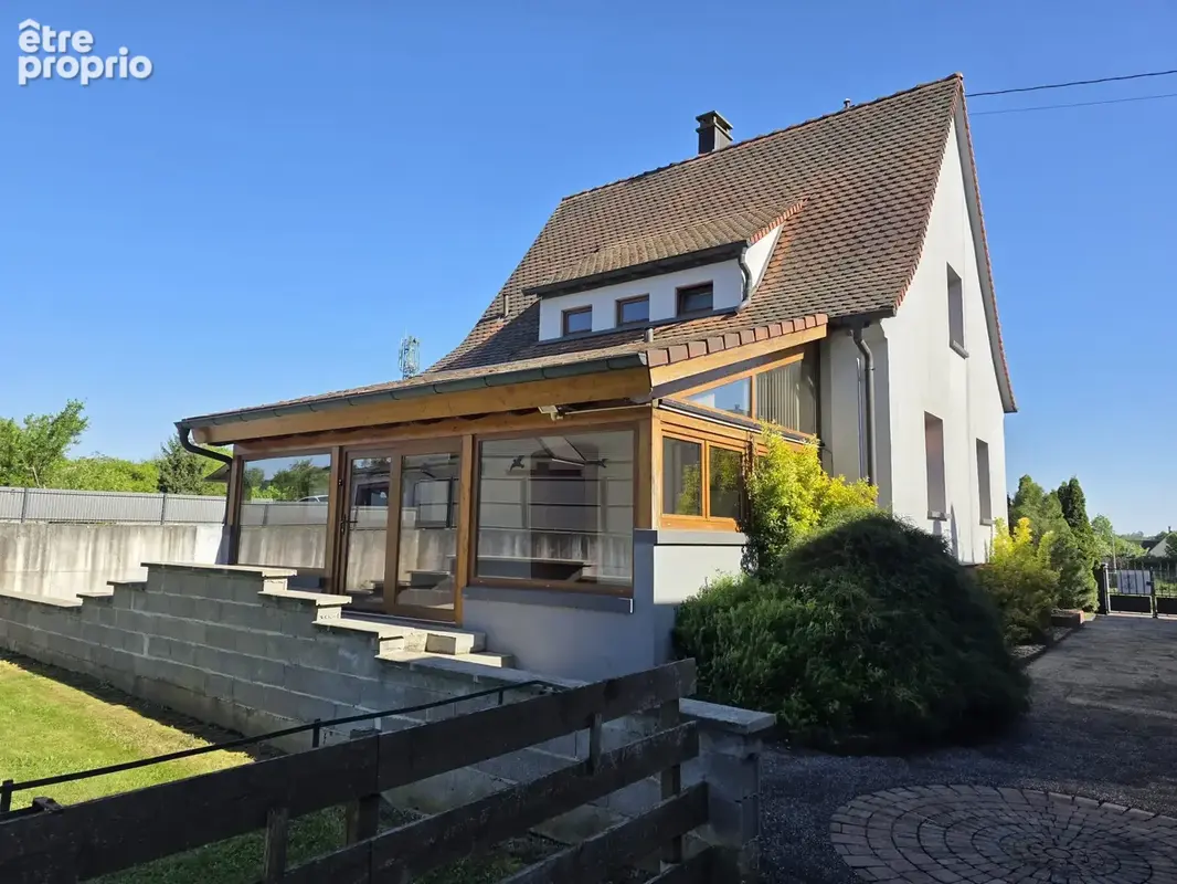 Maison individuelle avec véranda, jardin et garage - photo 1