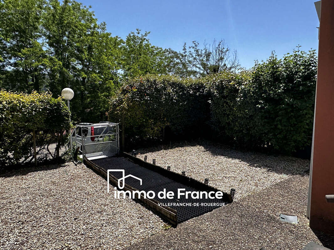 Appartement loué Villefranche De Rouergue 2 pièces, 78 m² avec jardin, garage et parking - photo 9