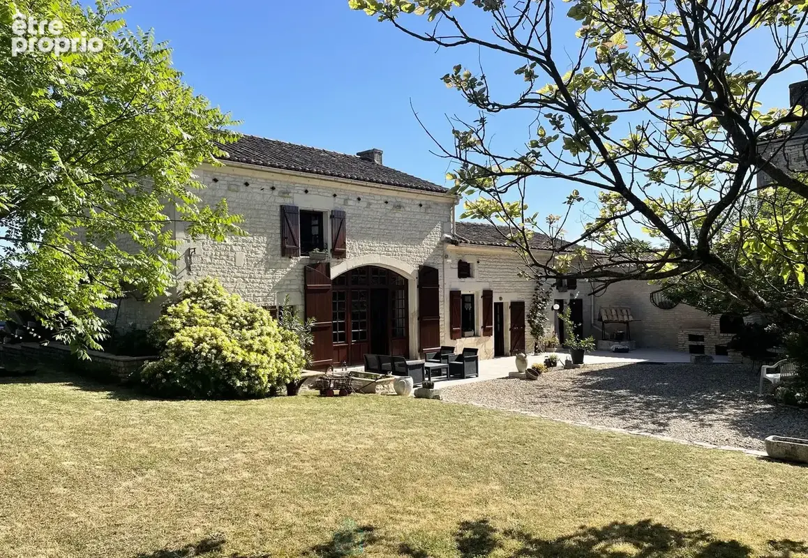 Maison à ECHALLAT