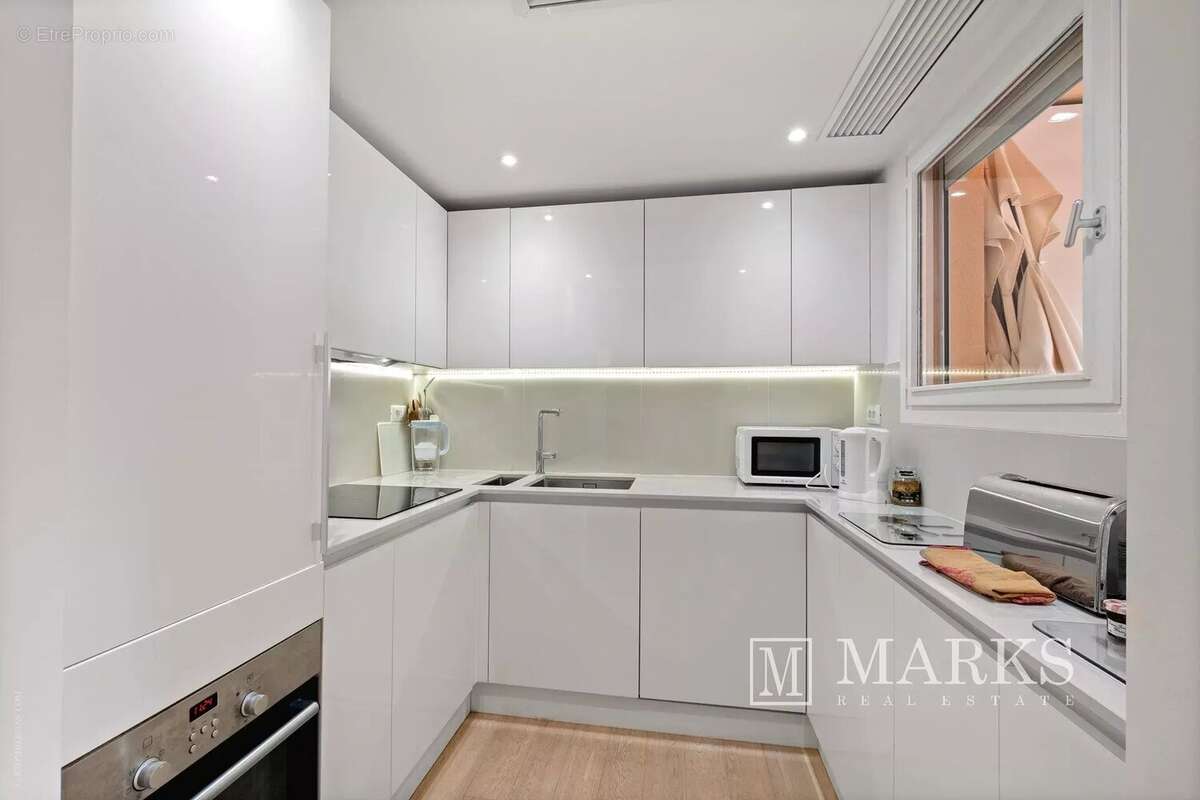 Généreux appartement de 3 chambres en rez-de-jardin - photo 8