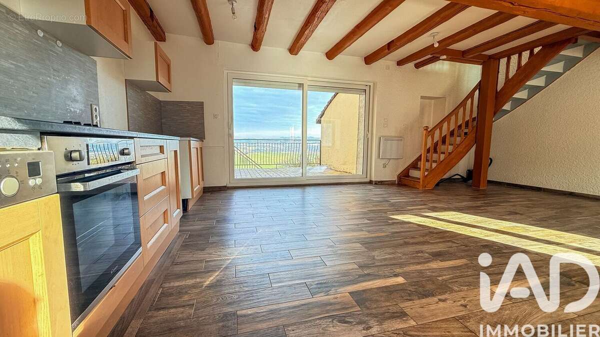 Photo 2 - Maison à SAINT-GENEST-LERPT