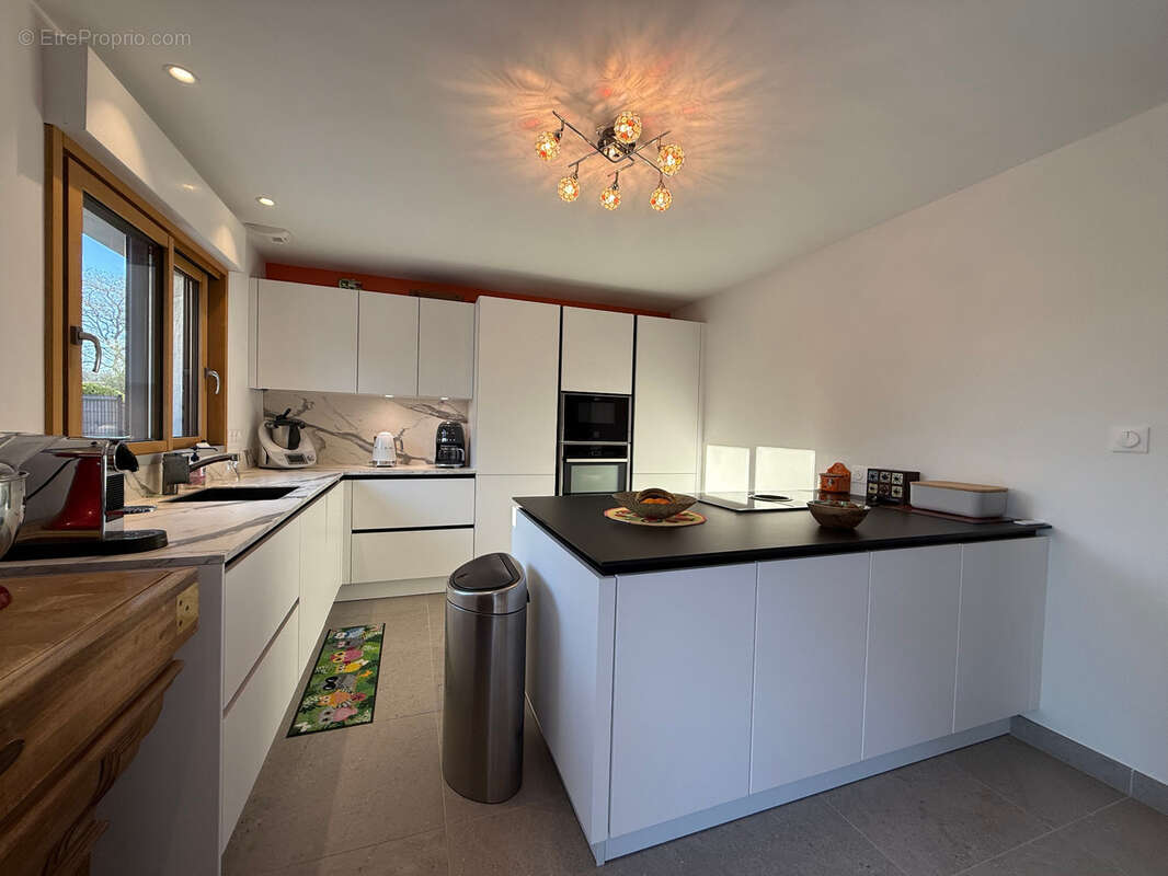 BEGMEIL (29) – Maison familiale rénovée avec prestations modernes, 5 chambres et terrasse plein sud à 700 m de la plage - photo 3