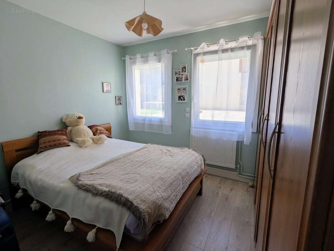 chambre 1 - Appartement à GRANDCAMP-MAISY