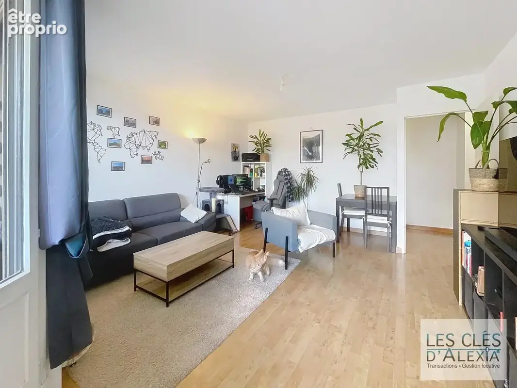 Joli T3 avec balcon, cave et parking - photo 2