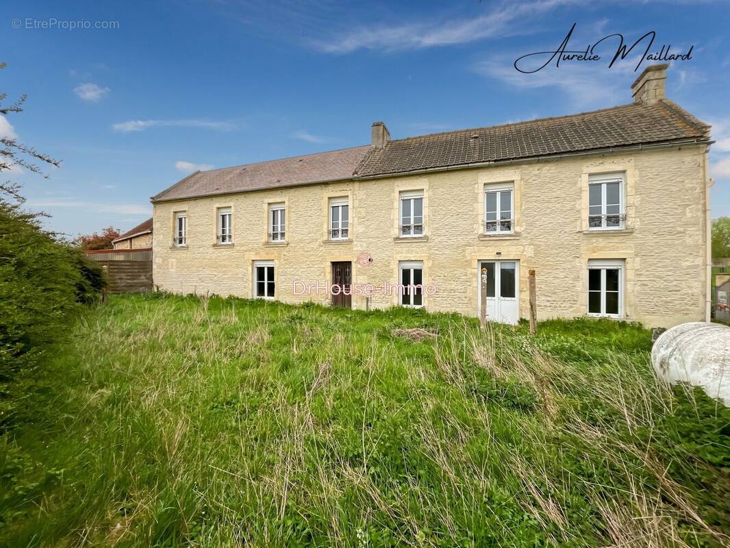 Maison à SAINT-AIGNAN-DE-CRAMESNIL
