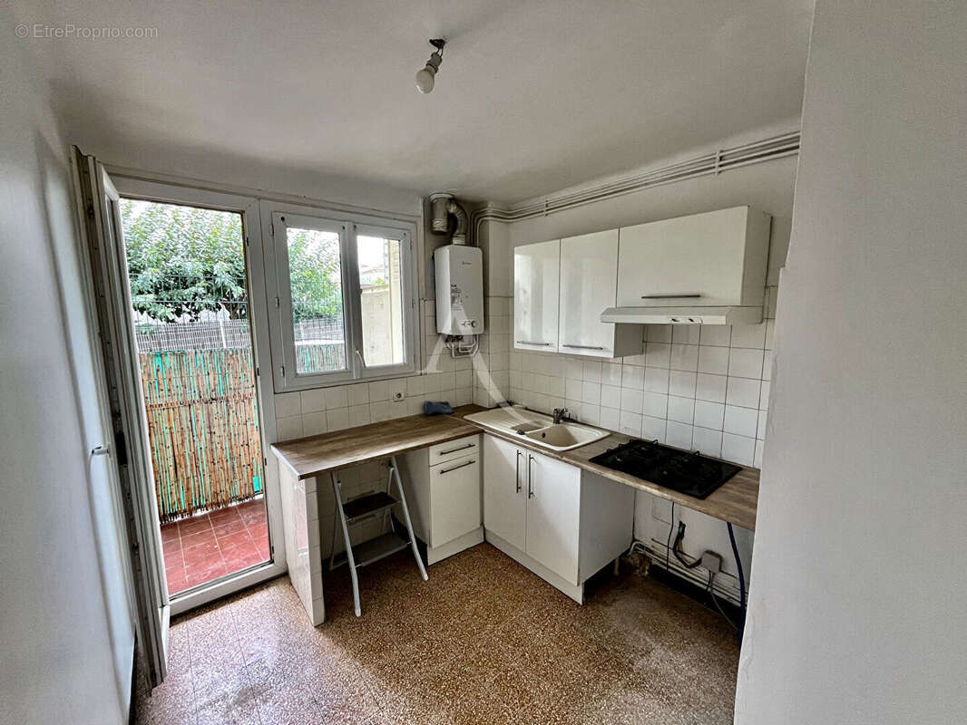 Appartement 3 pièces 51.57 m2 traversant parking et cave! - photo 2