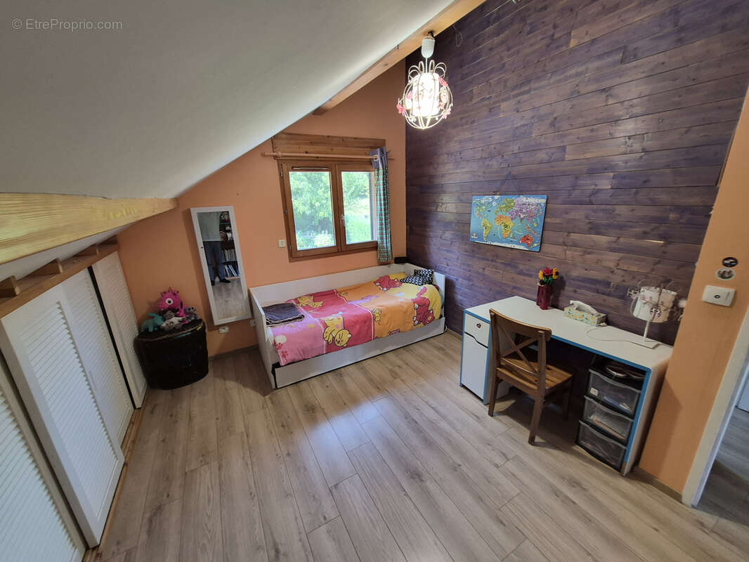 Maison individuelle de 2011 de type ossature bois de 141 m2 édifiée sur un terrain de 2292 m2 - photo 11
