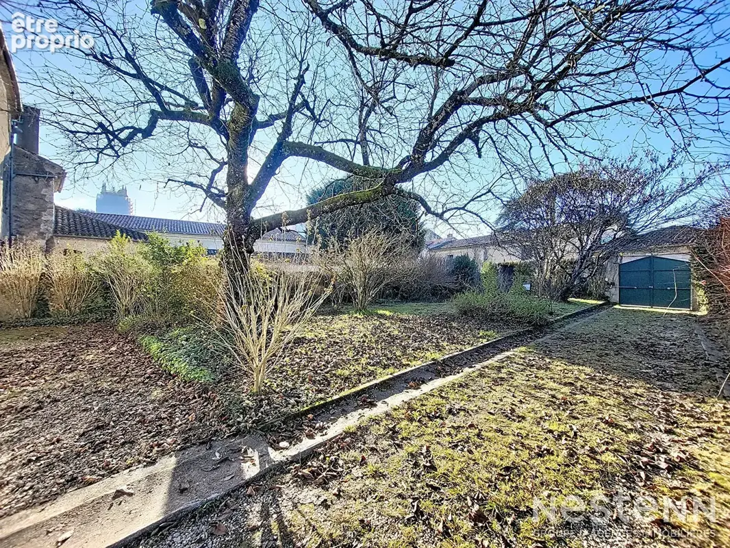 A Vendre Maison de ville en pierre rénovée avec garage et jardin à proximité immédiate du centre-ville - photo 13