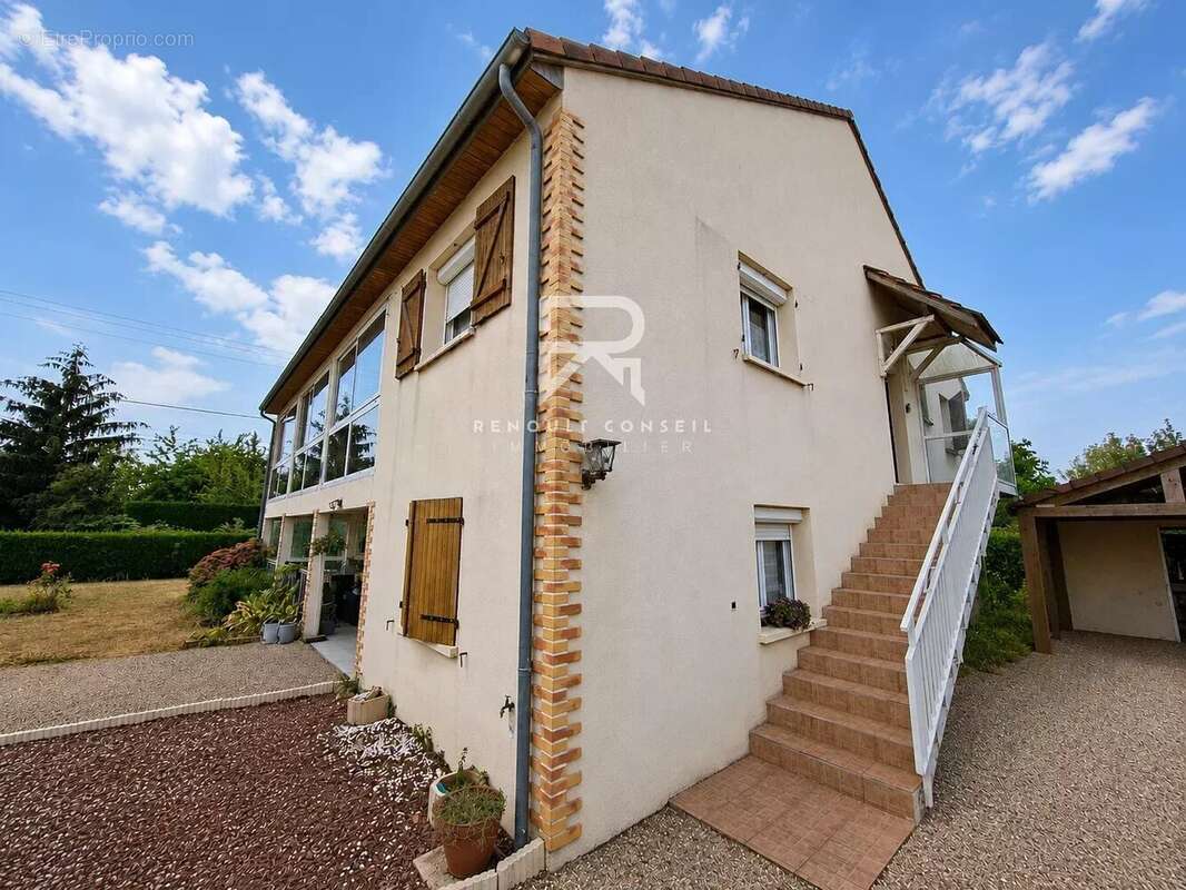 Maison familiale avec deux habitations pouvant être indépendantes - photo 2