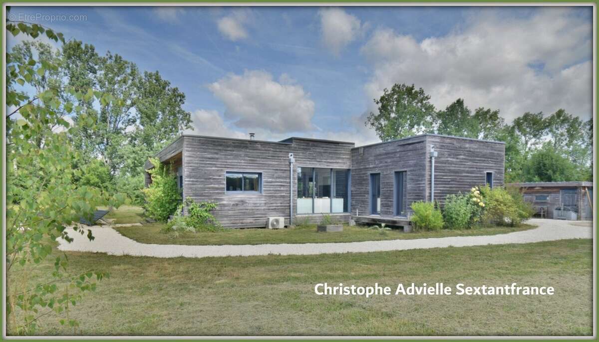 Villa d'architecte ossature bois, plain pied , 4 chambres , piscine, garage et atelier sur 1,6 Ha - photo 3