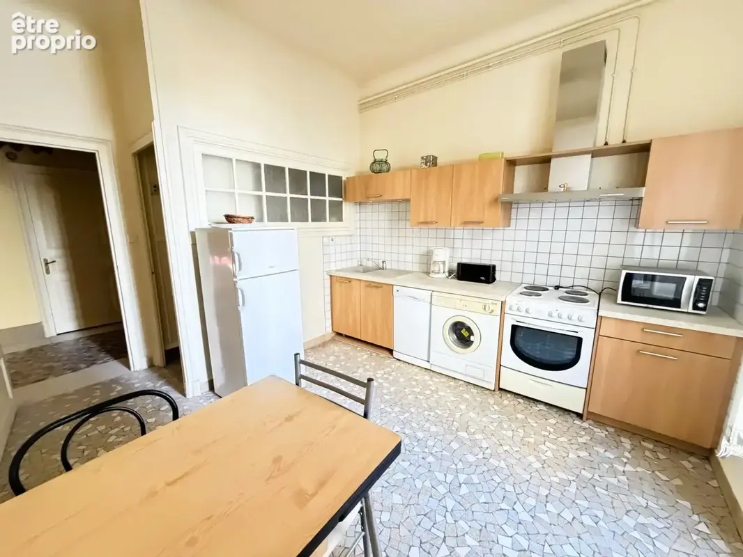 APPARTEMENT T3 traversant 92 m2 face aux parcs - photo 9