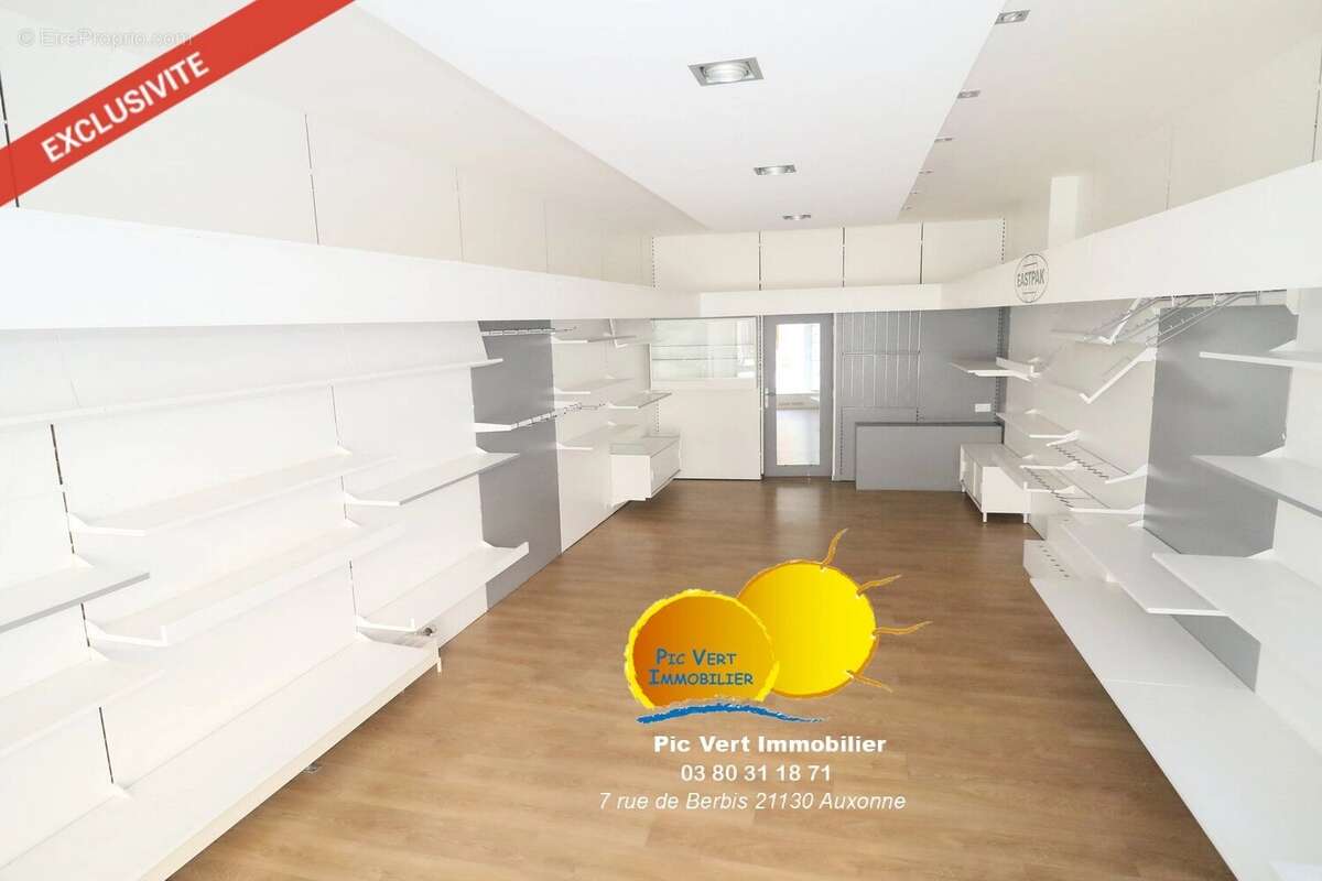 Immeuble avec commerce et 3 appartements, greniers, patio, garage - photo 11