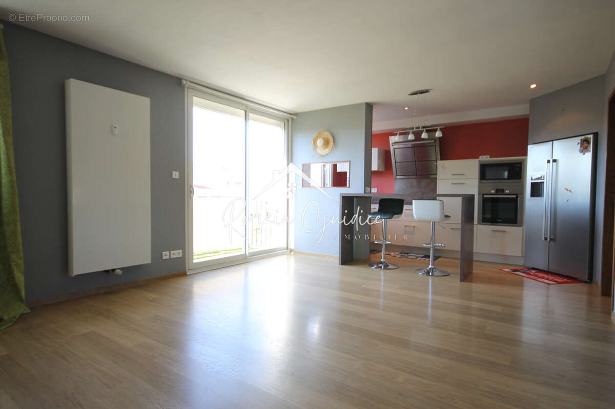 Appartement type 3 de 71 m2 avec balcon et places de parking - photo 3