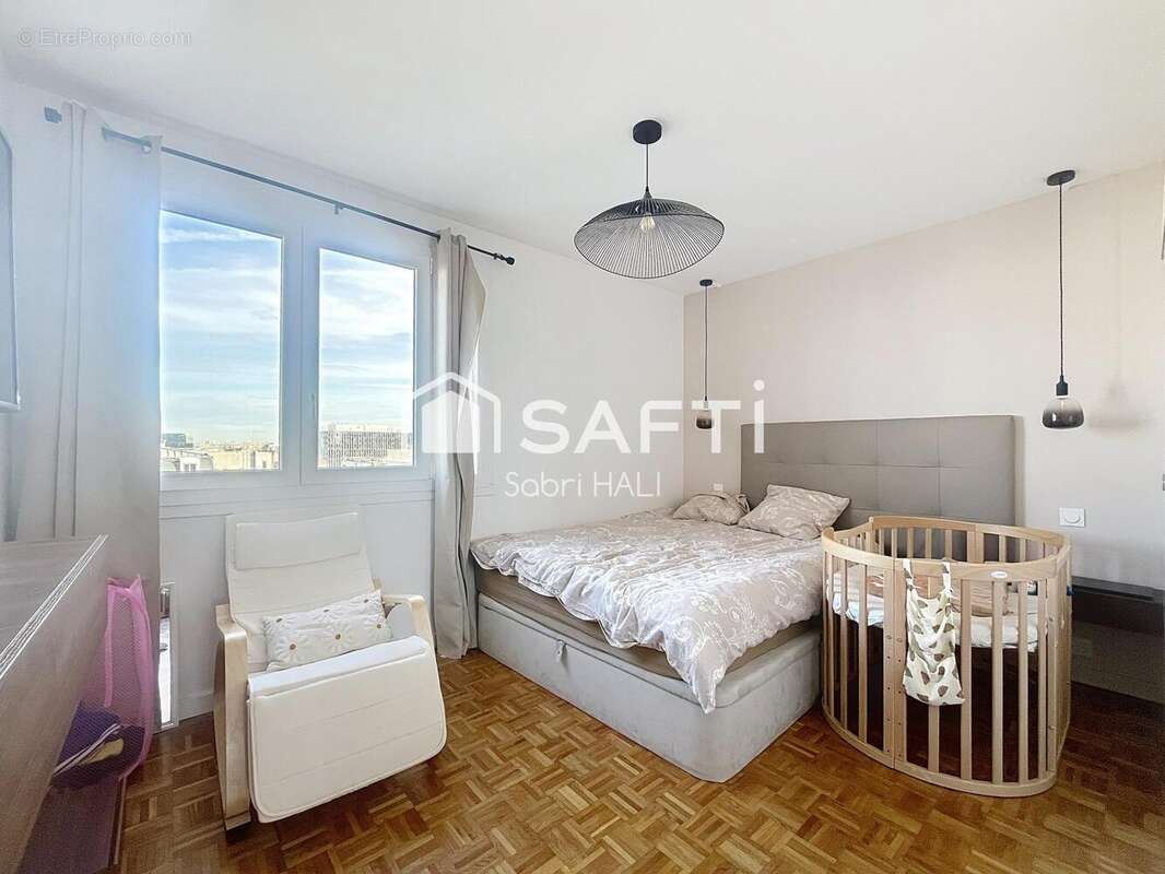 Photo 9 - Appartement à COURBEVOIE