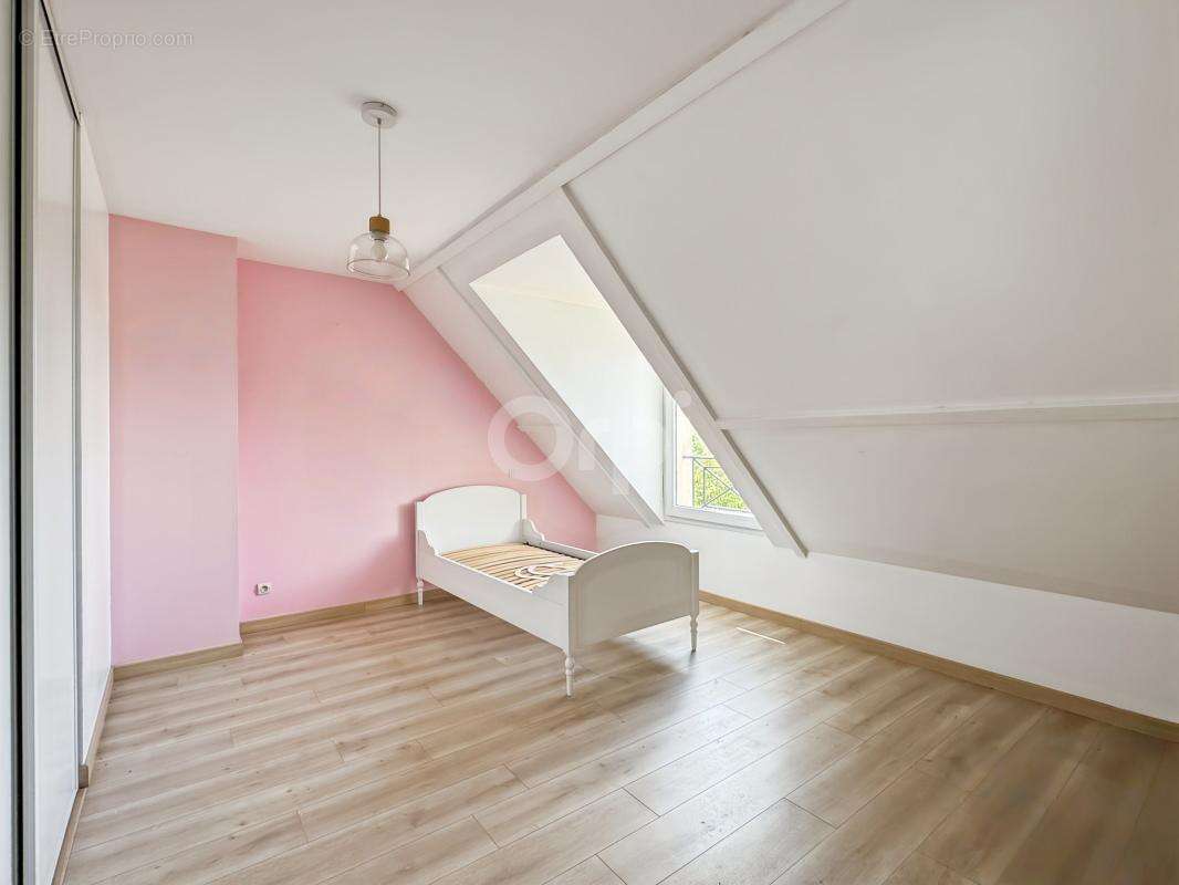 Maison familiale dans le secteur recherché de Saint Michel à Evreux - photo 11