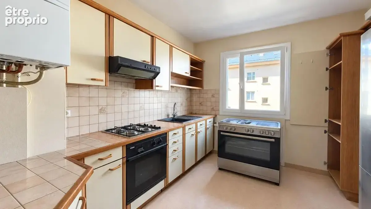 Appartement T4 82 m² – 3 chambres, balcon, garage et parking – Onet-le-Château - photo 6