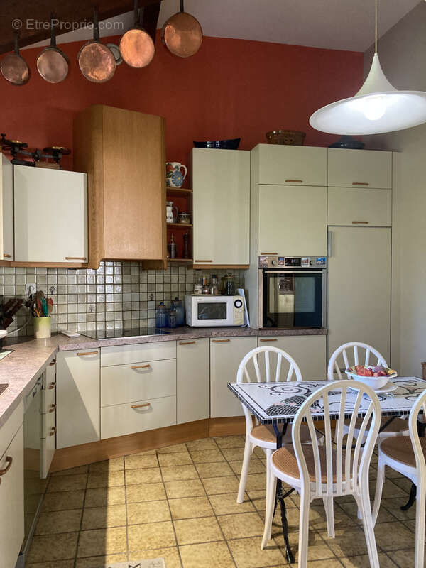 Maison à VILLIEU-LOYES-MOLLON