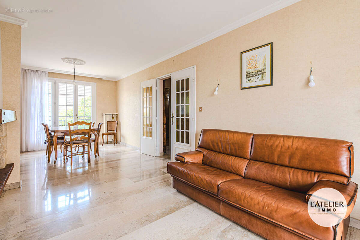 Maison familiale de 101 m² avec jardin et sous-sol complet - photo 4