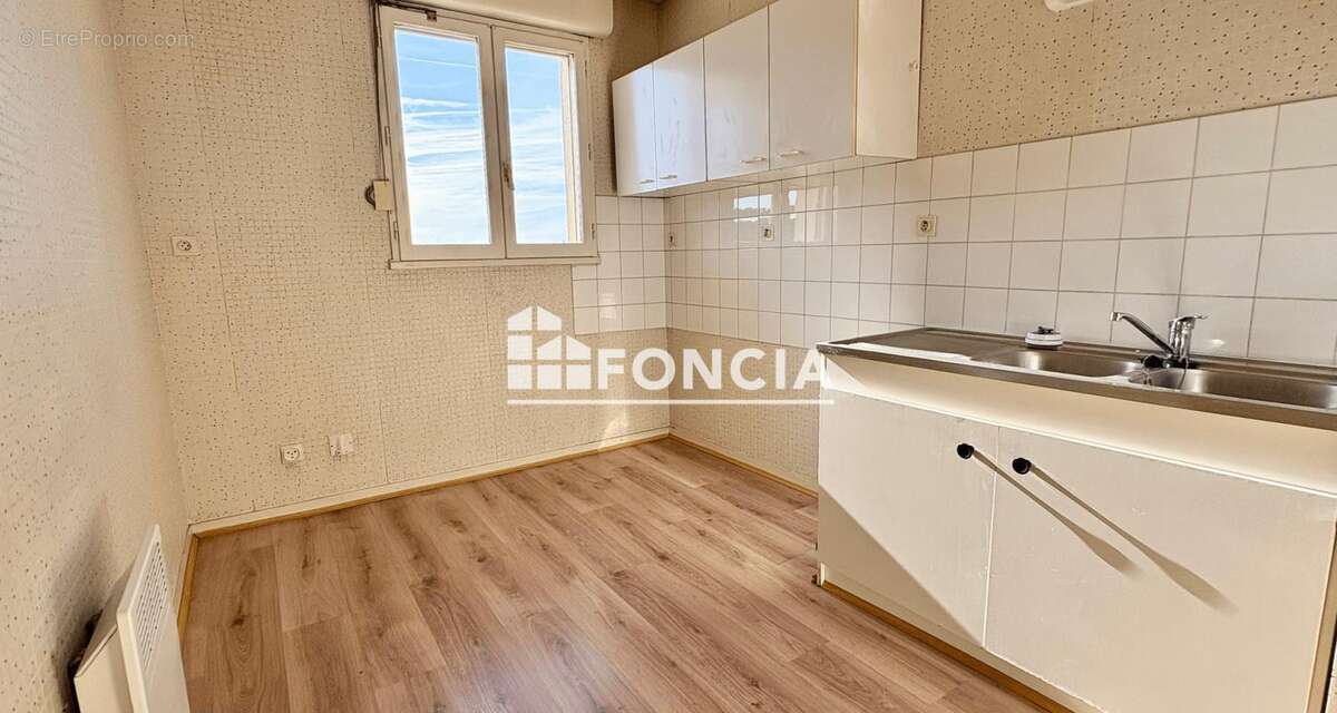 Appartement T2 avec parking et cave - photo 3