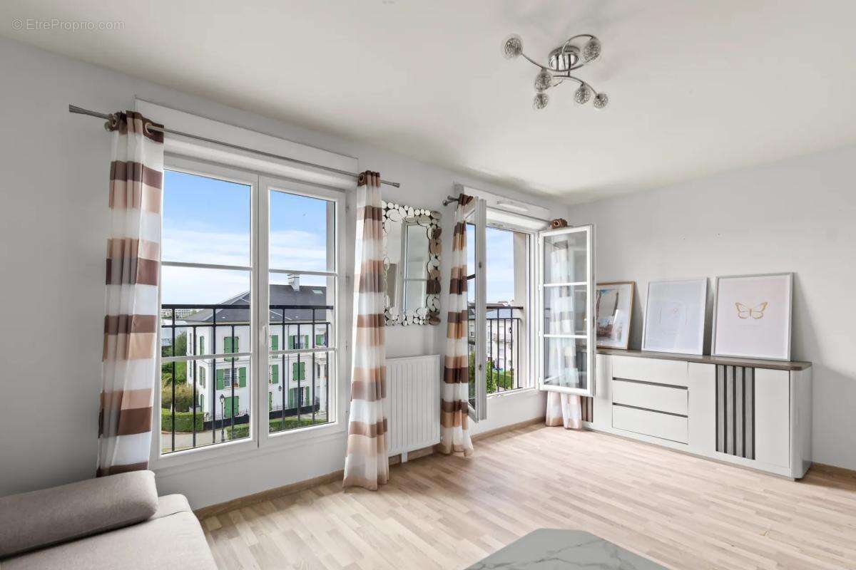 Appartement 3 pièces de 57 m² à Serris - photo 2